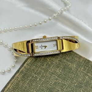 Gold Bulova Watch with Swarovski Crystals and Roman Numeral Markers